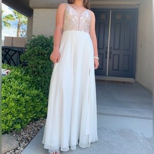 Long ivory white evening gown perfect for a formal event or prom